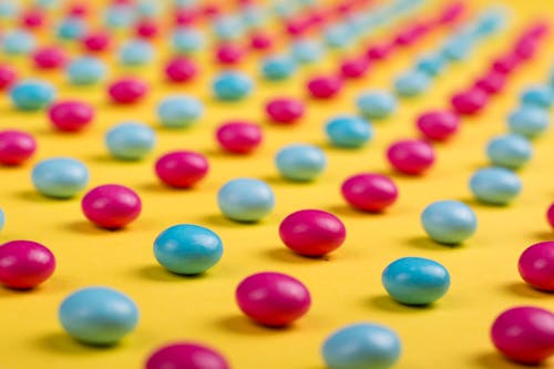 Free Selective Focus Photo of Round Pink-and-blue Beads Stock Photo