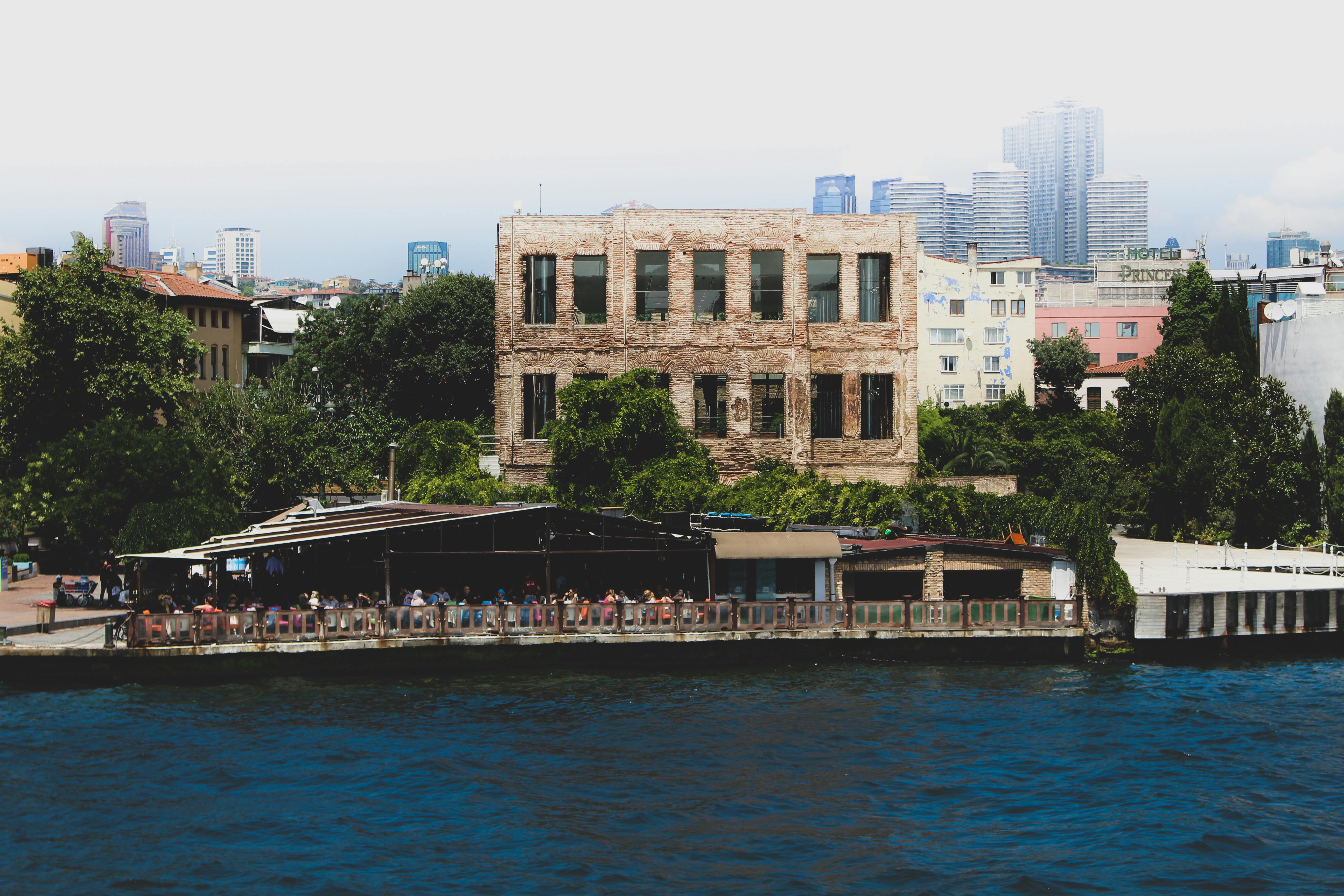 A person scrolling through social media feeds on a smartphone, showing curated images