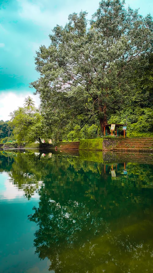 Foto profissional grátis de acima da água, agua verde, céu bonito