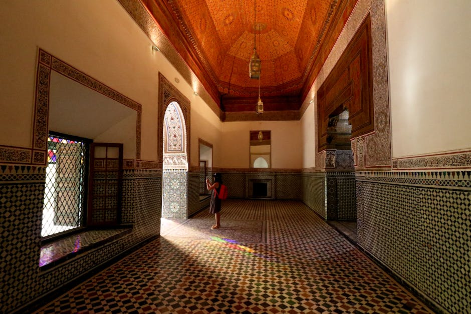 A Girl Standing at the Hallway of Bahia Palace in Marrakech, Morocco