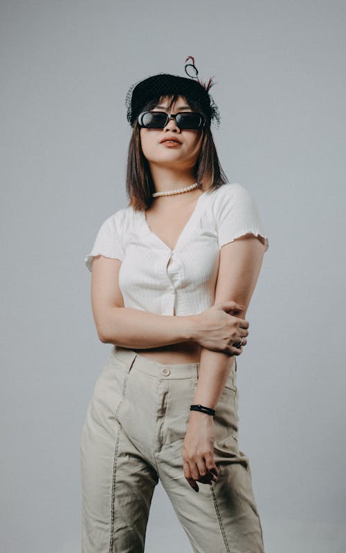 Woman Posing on Gray Background