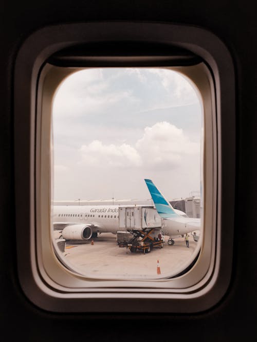 Passenger Jet on a Airstrip Seen trough Window