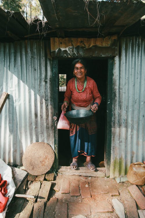 Standing Woman on a Doorstep