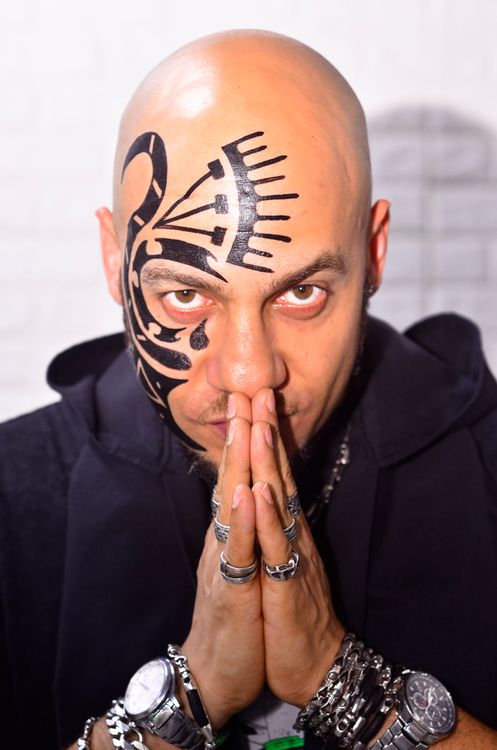 A Bald Man with Tattoo on the Face · Free Stock Photo
