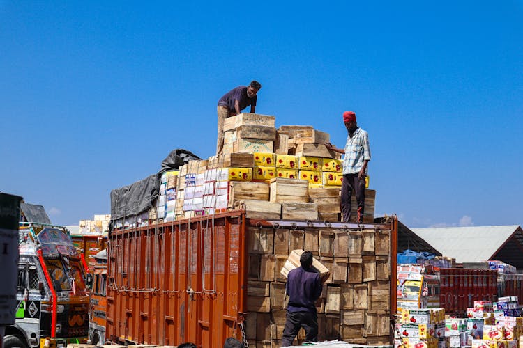 Loading A Cargo Truck With Boxes 