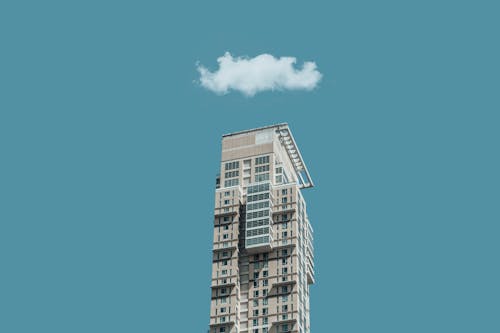 Low-Angle Shot of a High Rise Building under the Blue Sky