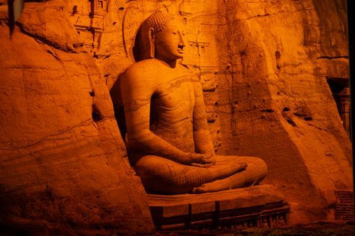 Free Explore the serene rock-cut Buddha statue at Gal Vihara in Polonnaruwa, Sri Lanka, a symbol of Buddhist heritage. Stock Photo
