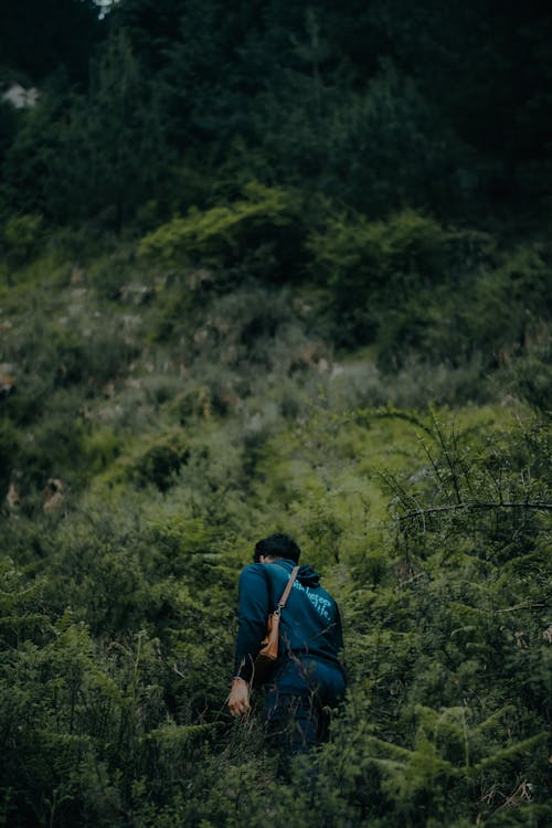 Man Hiking Up the Mountains