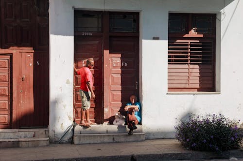 Men Waiting in an Entrance to a Building