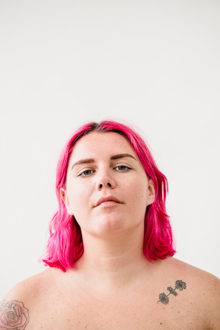 Photo Of A Woman With Pink Hair 