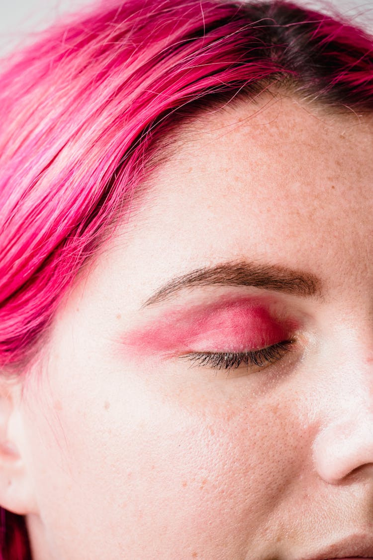 Woman With Pink Hair And Eye Shadow 