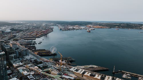 Aerial View of City Buildings Near Body of Water