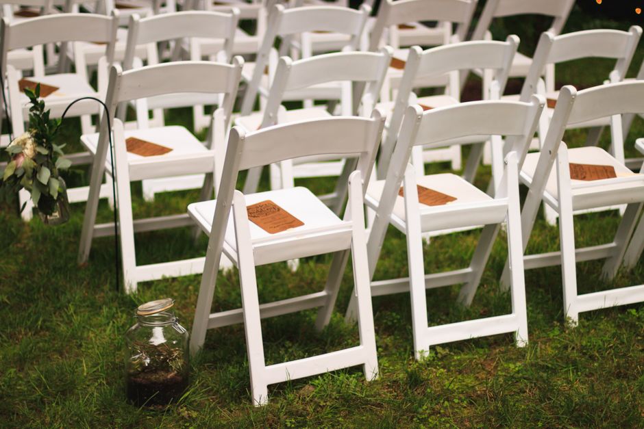White wooden chairs arranged for an outdoor event or wedding ceremony in Southern Utah