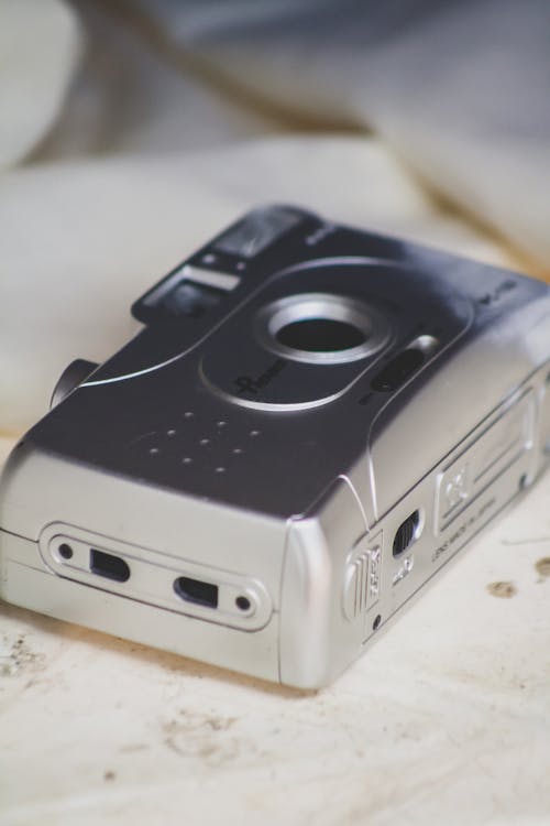 Close-Up Shot of a Silver Camera