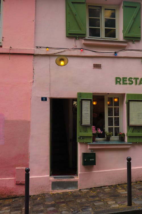 Pink Wall of Building with Restaurant