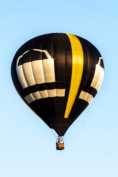 A Hot Air Balloon Across the Blue Sky