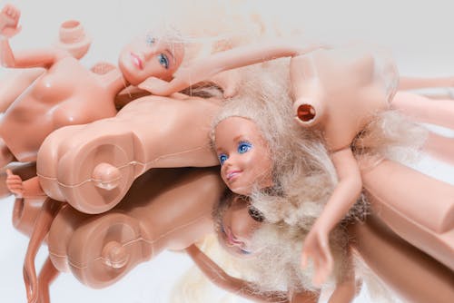 Free Pile of Barbie Dolls Stock Photo