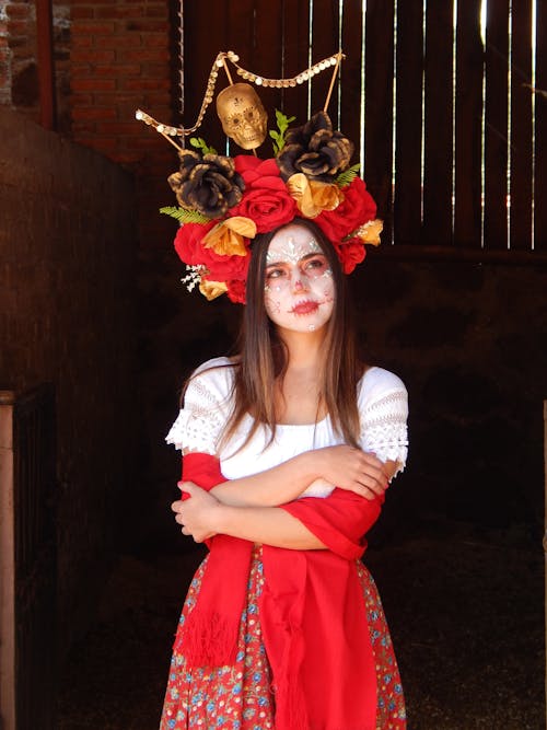 Woman Wearing a Floral Headdress with Skull