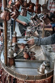 A bustling street scene capturing the art of traditional Turkish coffee making.