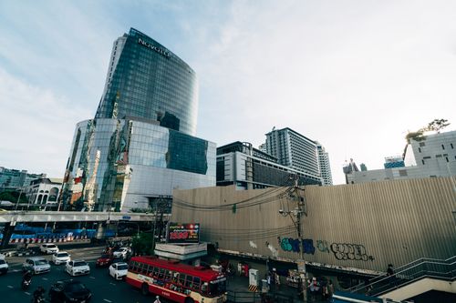Free View of modern skyscrapers and bustling traffic in Bangkok, Thailand. Stock Photo