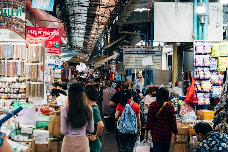 People Walking In A Market