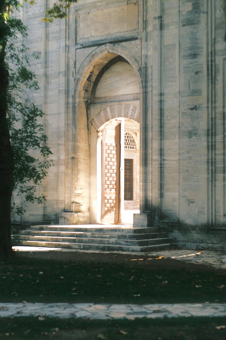 Concrete Building With A Arched Doorway