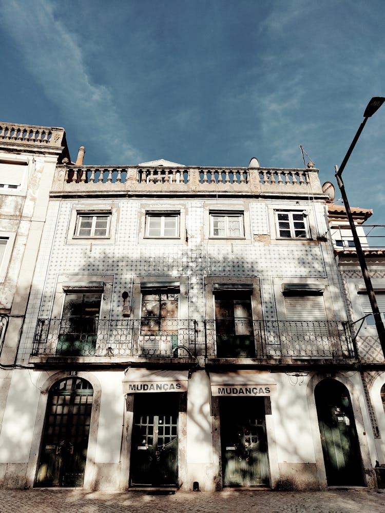 White Concrete Building Under Blue Sky