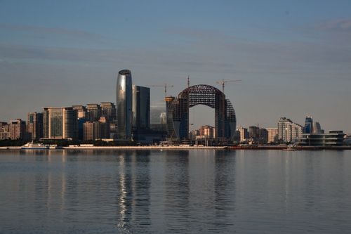 Free Stunning Baku skyline showcasing modern architecture along the waterfront under a clear sky. Stock Photo
