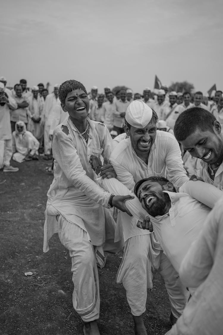 Men Celebrating A Festival With Fun Games