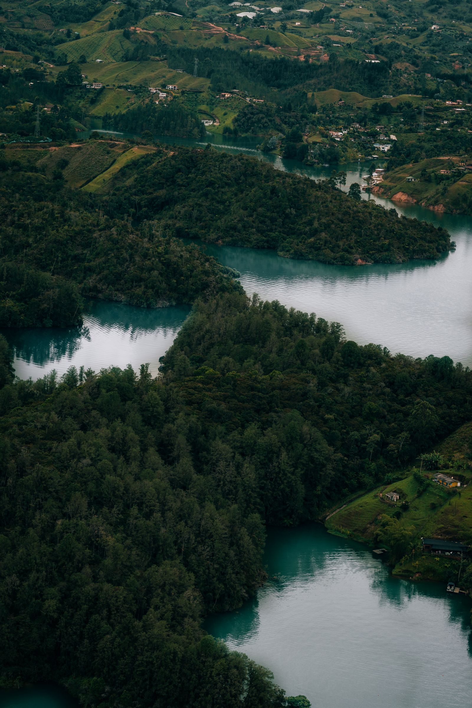 An aerial view of the green islands and waterways of the Guatape reservoir