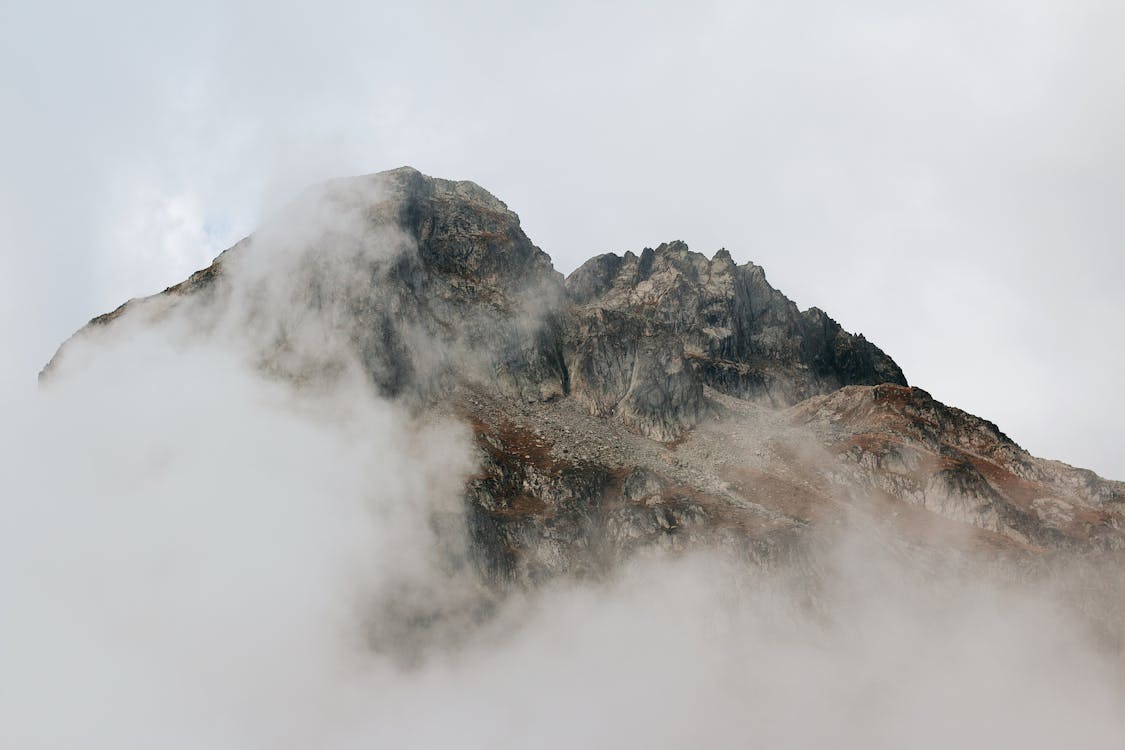 Rocky Mountain Covered with Low Lying Clouds