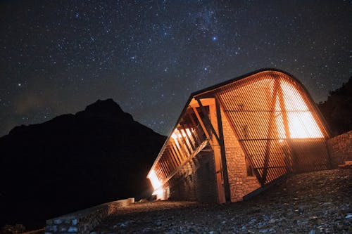 Brown Wooden Bridge Under Starry Night