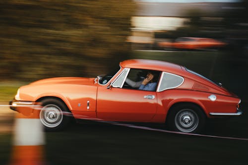 Red Sportscar on the Road