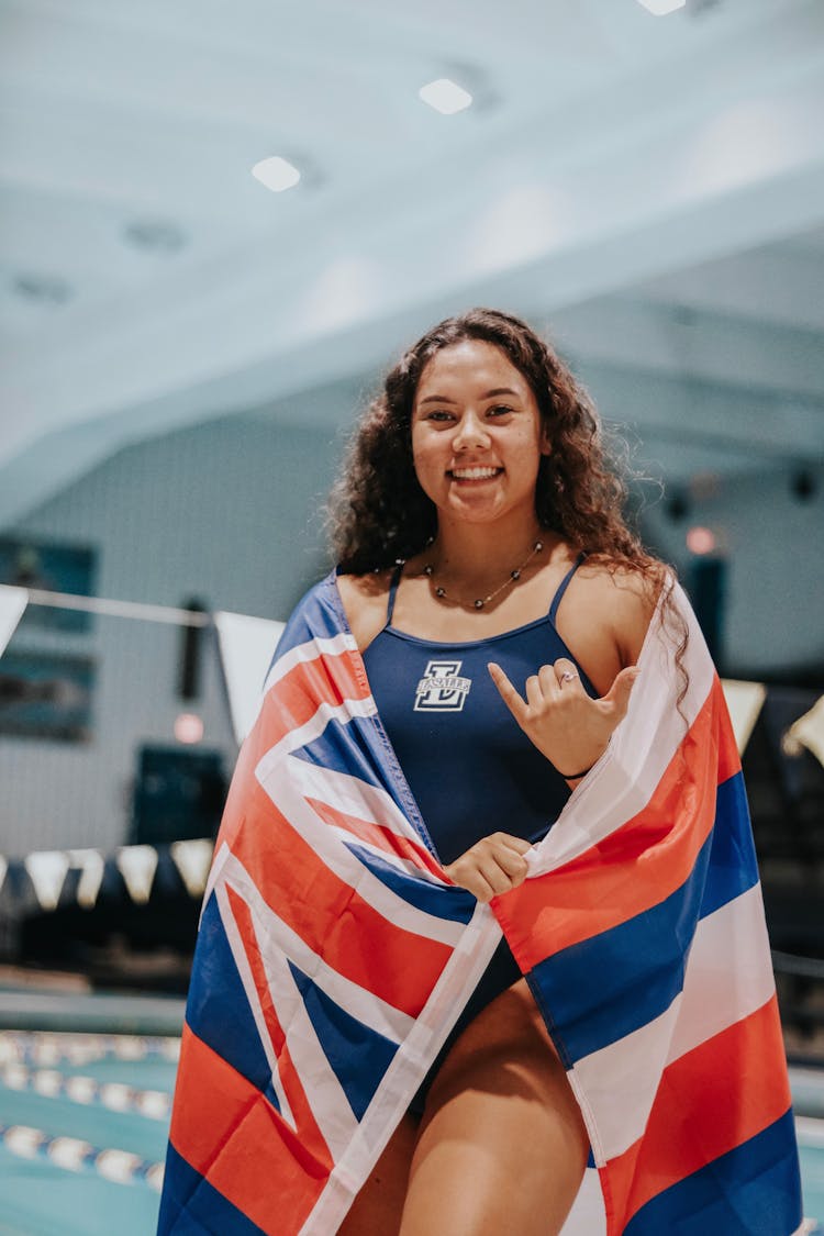 A Swimmer Draped With The United Kingdom Flag