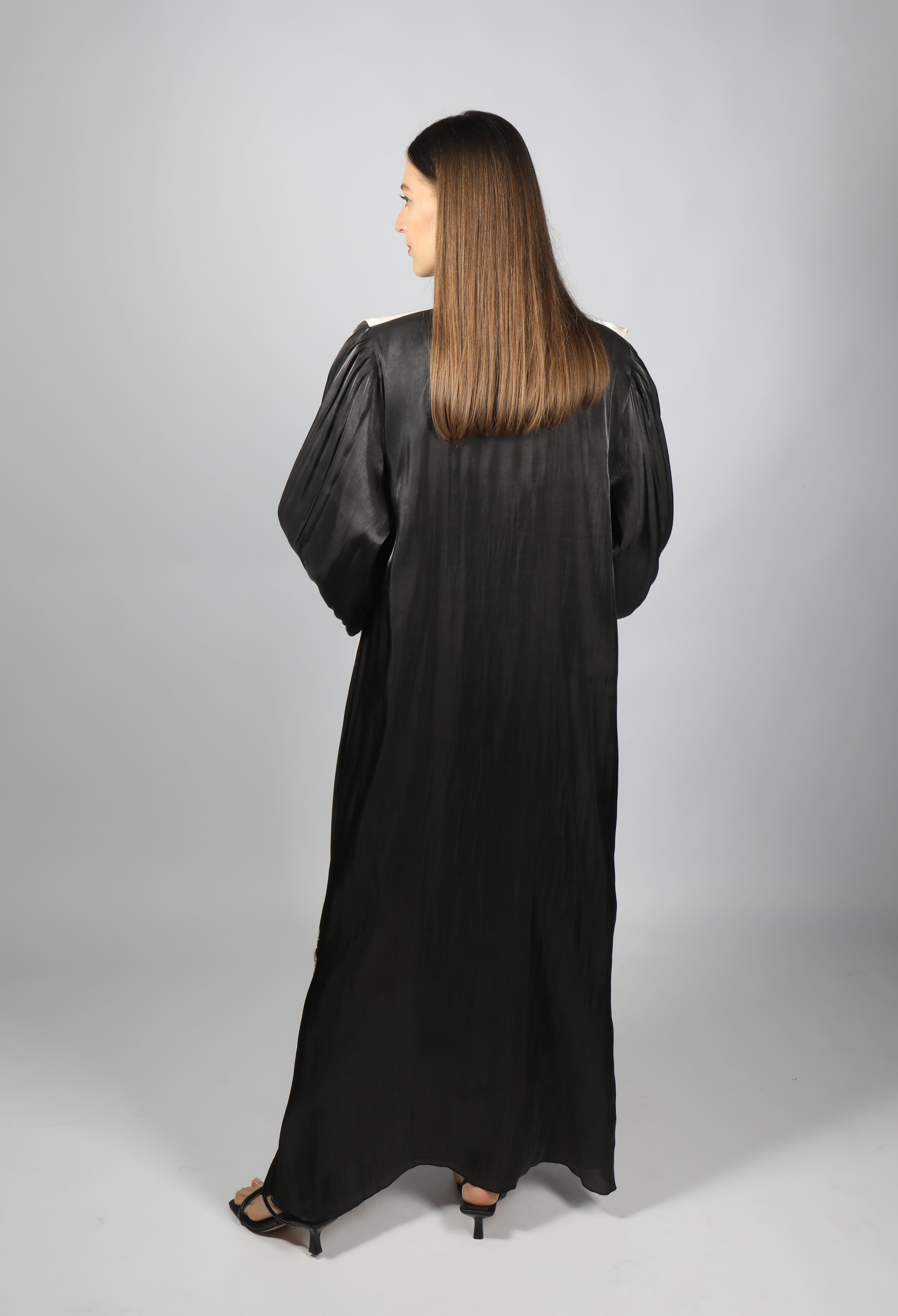 Back View of a Woman Wearing Black Dress · Free Stock Photo