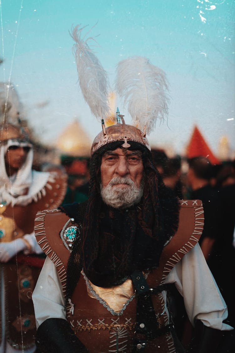 Man In A Costume Among The Crowd On An Event 