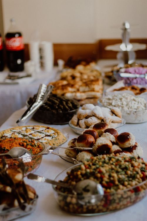 Free A diverse spread of Turkish dishes including pastries and salads on a table ready for celebration. Stock Photo