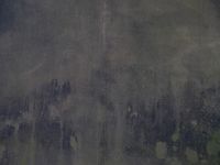 Dark cast concrete panel — photo by Alfredo Marco Pradil on Pexels
