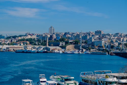 View of Boats in a Port and Skyline of Istanbul under Blue Sky 