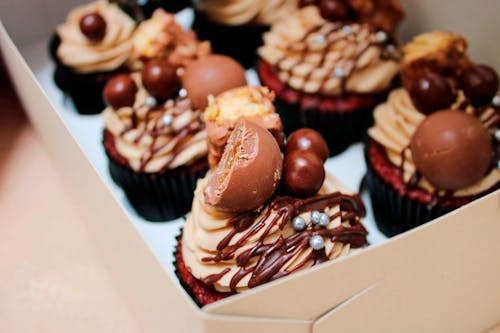 Free Mouthwatering Cupcakes in a Box Stock Photo