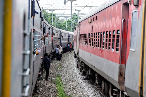 Commuters Standing Beside the Train