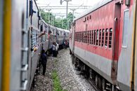 Passengers on trains at a station, interacting and traveling. Captures public transport dynamics.