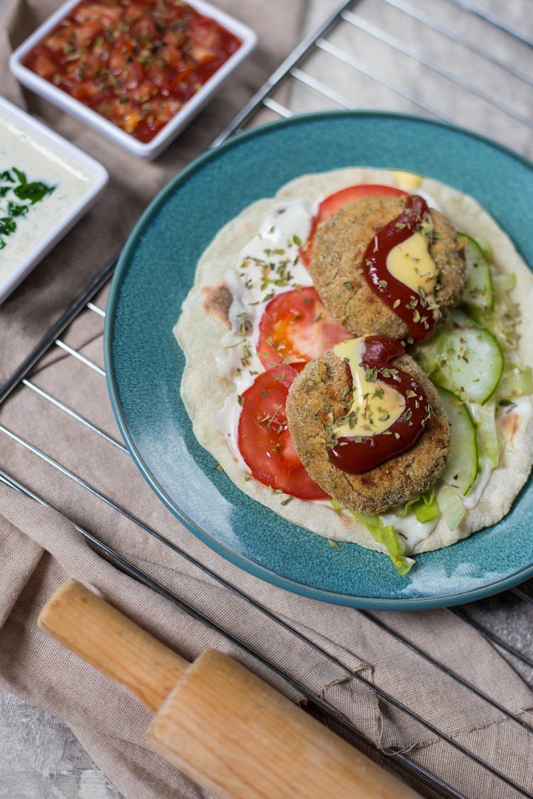 Falafel And Sliced Vegetables On A Flatbread