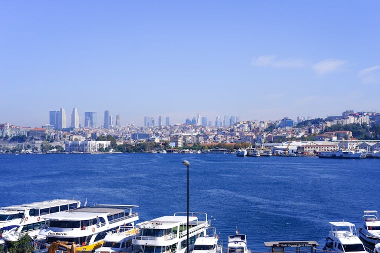 Ferry Boats Docked On Bosphorus Strait In Turkey