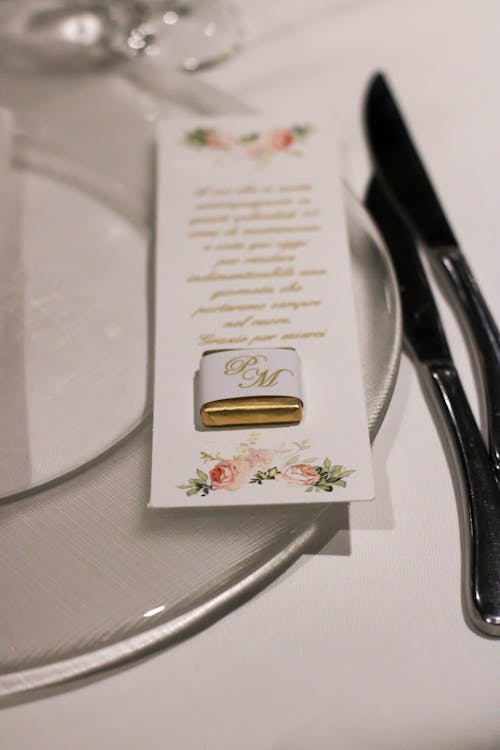 Free Chocolate on Wedding Place Setting Stock Photo