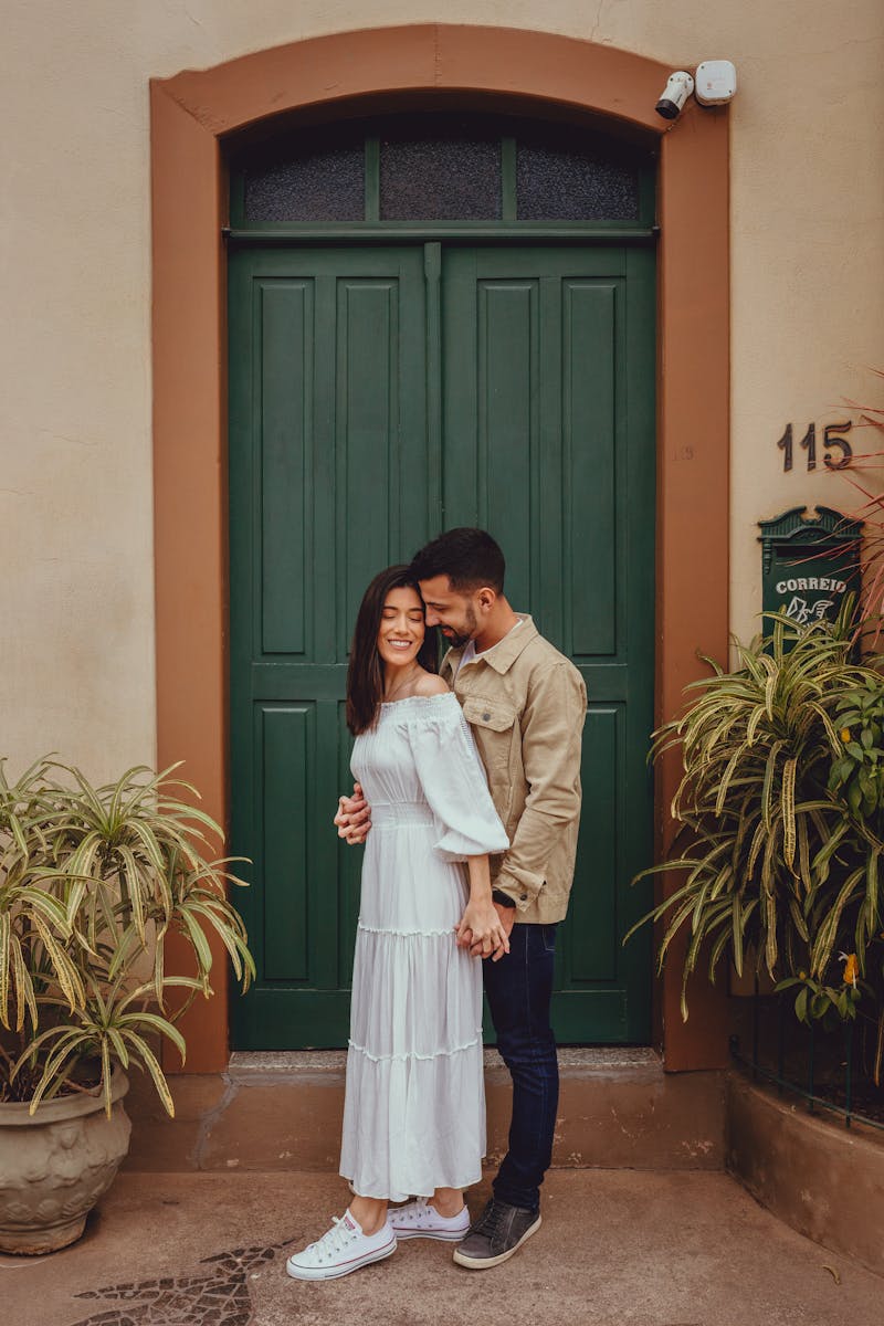 Couple during engagement session in a park