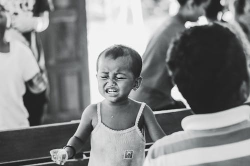 Grayscale Photography of Child in Spaghetti Strap Top