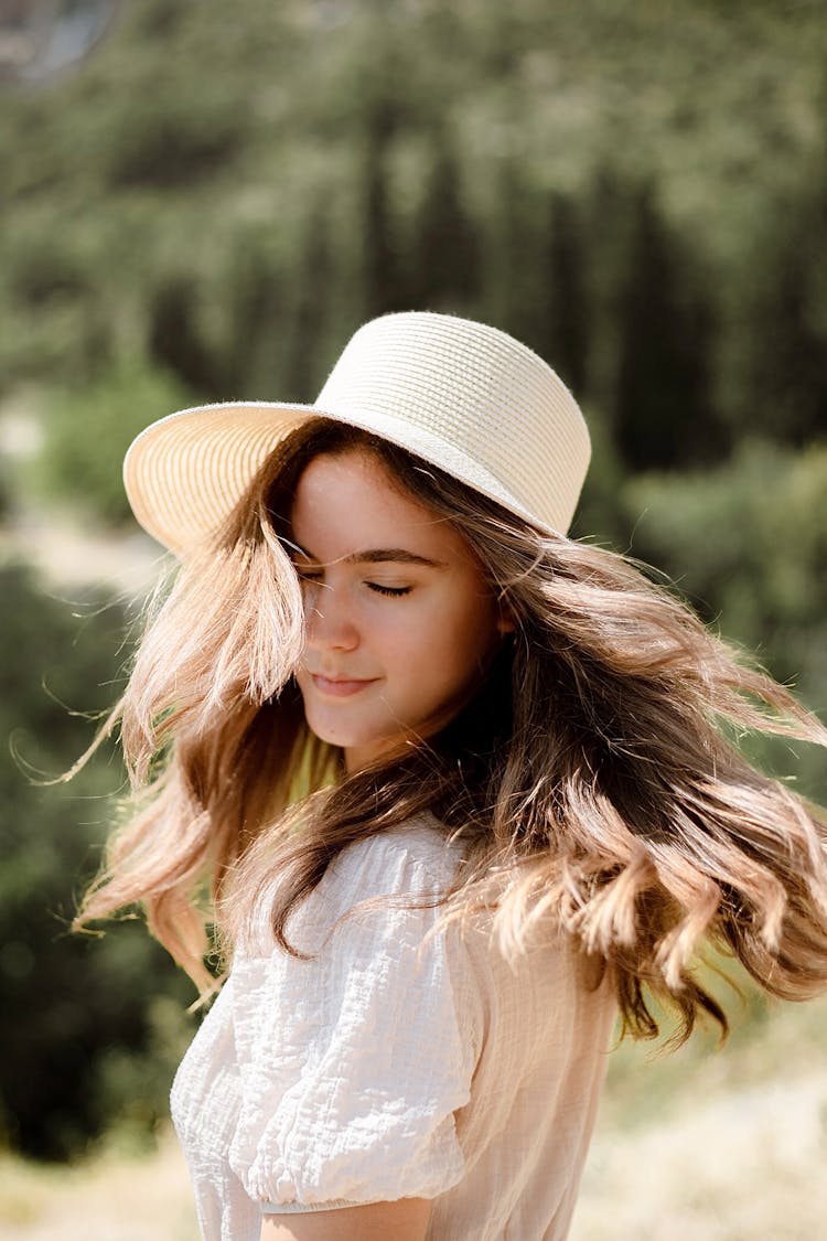 Pretty Girl In Hat And White Dress