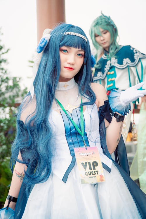 A Beautiful Woman Wearing a Snow Miku Costume