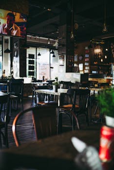 Warm and inviting restaurant interior showcasing modern decor and ambient lighting.
